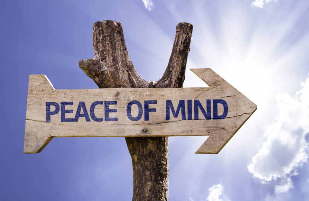 Arrow sign saying 'peace of mind'